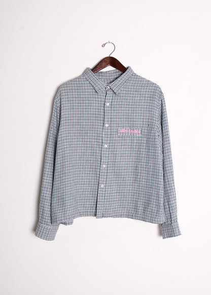 (hanger front): 1960's Blue Check Flannel Shirt – front on hanger, vintage blue micro-check long-sleeve shirt with pink Lillies Studios chest embroidery, upcycled – Lillies Studios