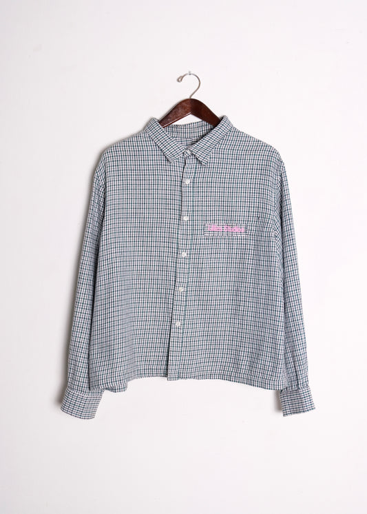 (hanger front): 1960's Blue Check Flannel Shirt – front on hanger, vintage blue micro-check long-sleeve shirt with pink Lillies Studios chest embroidery, upcycled – Lillies Studios