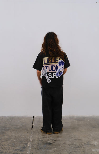 Black graphic print T-shirt from Vintage Dickies, showcasing upcycled workwear design.