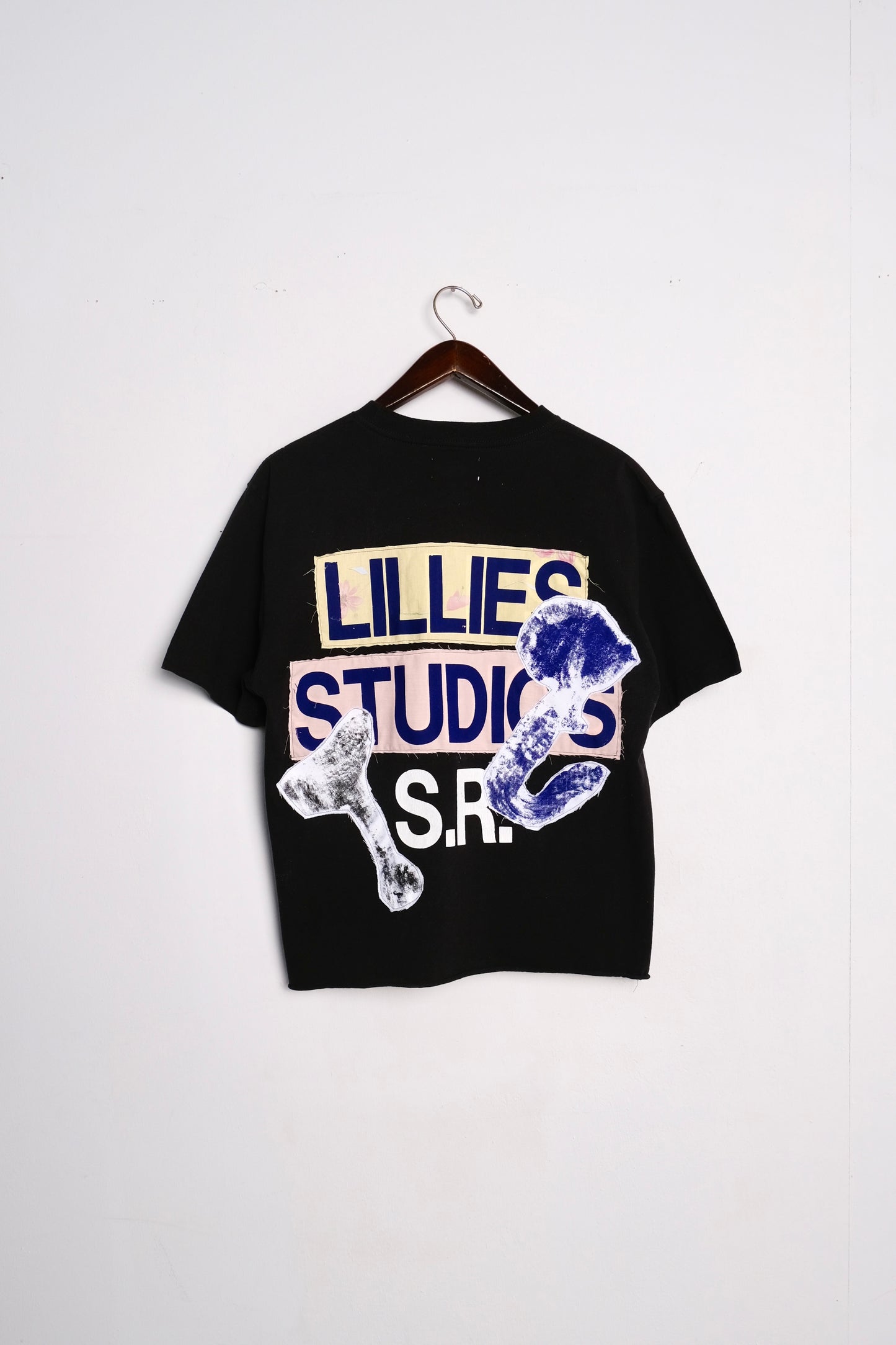 Black graphic print T-shirt from Vintage Dickies, showcasing upcycled workwear design.