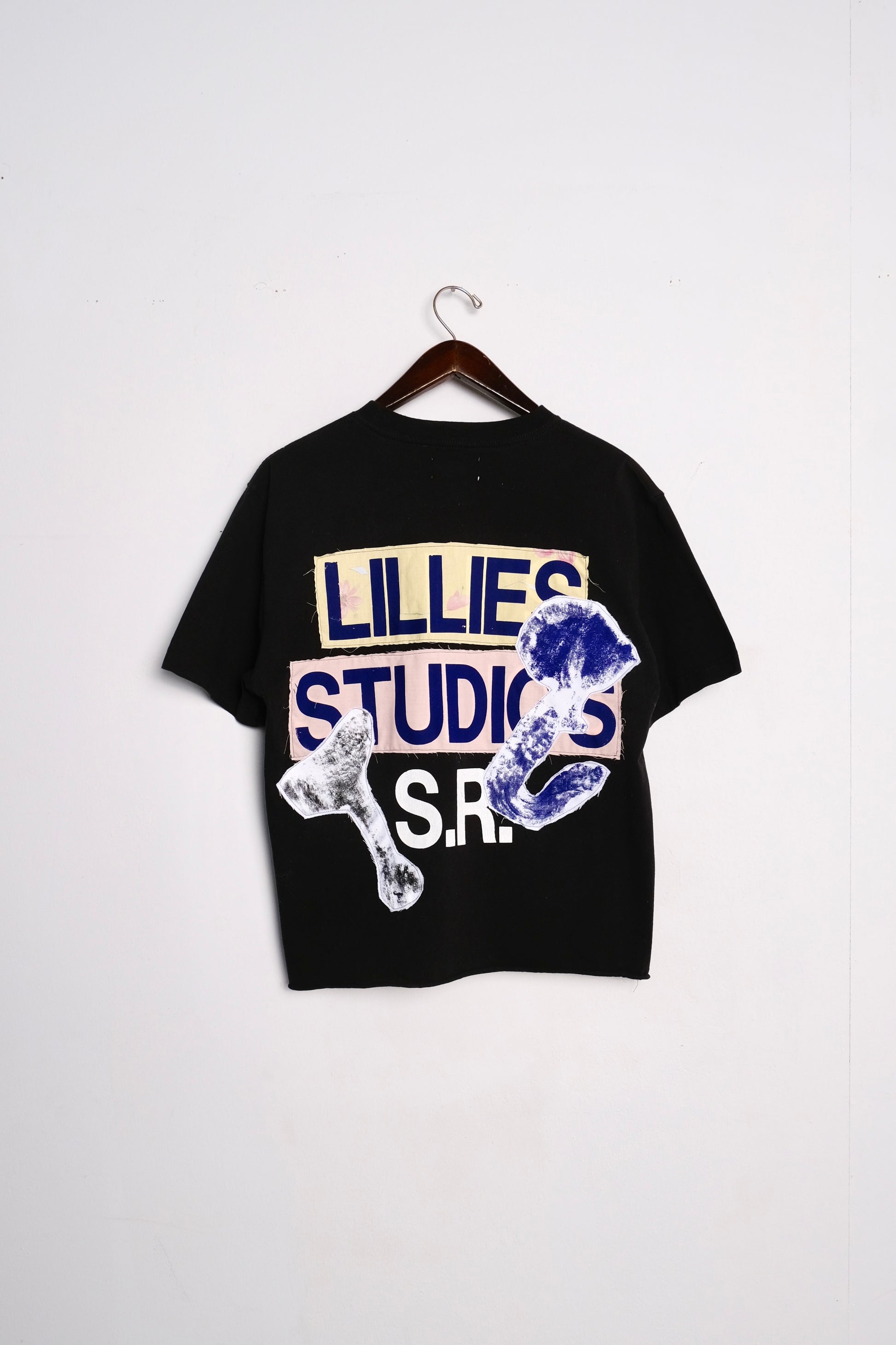 Black graphic print T-shirt from Vintage Dickies, showcasing upcycled workwear design.