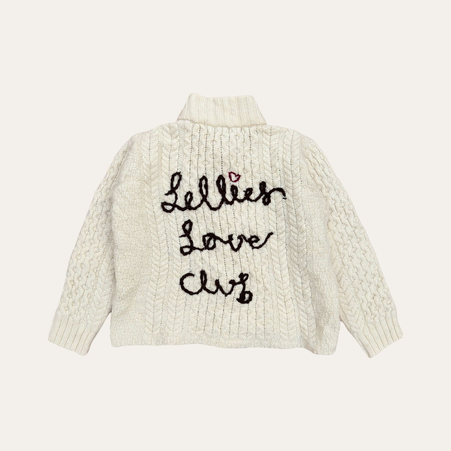 Hand-embroidered fisherman sweater Cardigan with vintage inspired typography, crafted from genuine second-hand Irish Aran Sweaters.