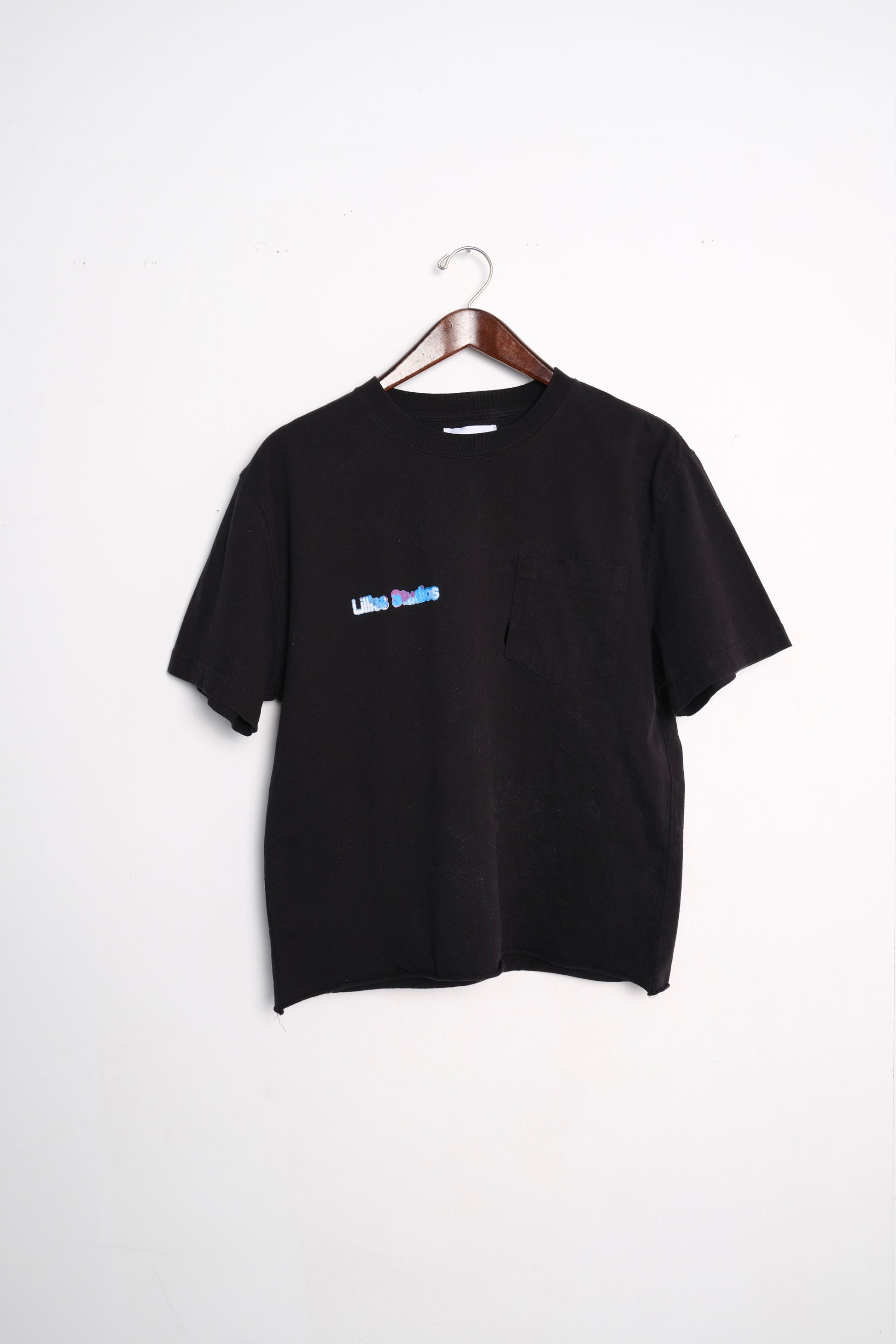 Black graphic print T-shirt from Vintage Dickies, showcasing upcycled workwear design.