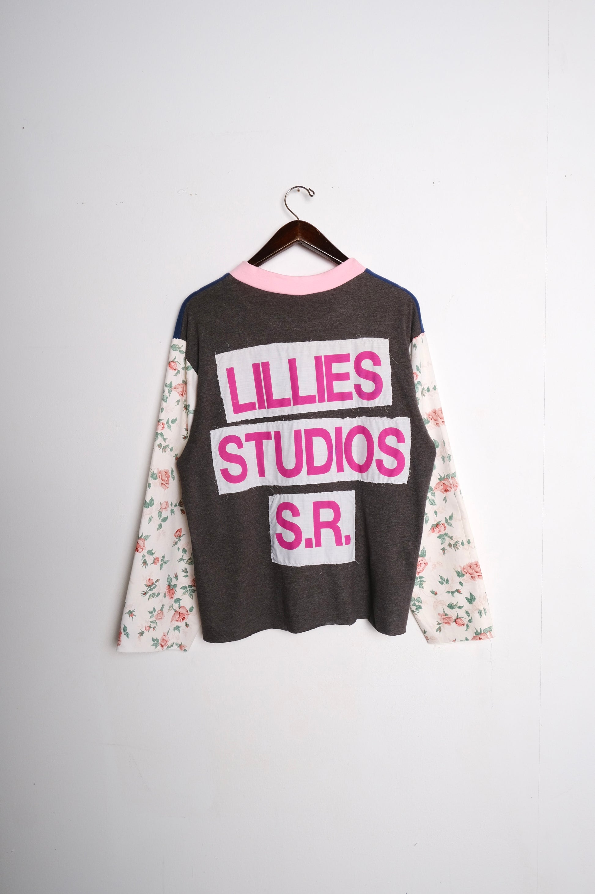 Long Sleeve Up-cycled Vintage Tee – front close-up worn, navy body with Lillies Studios chest patch and cream floral sleeves – Lillies Studios