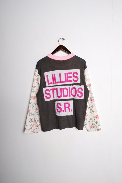 Long Sleeve Up-cycled Vintage Tee – front close-up worn, navy body with Lillies Studios chest patch and cream floral sleeves – Lillies Studios