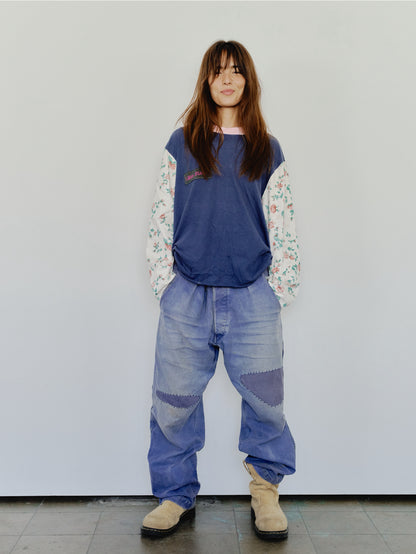 Long Sleeve Up-cycled Vintage Tee – front view worn, navy body with pink collar and floral patchwork sleeves, Lillies Studios chest patch – Lillies Studios