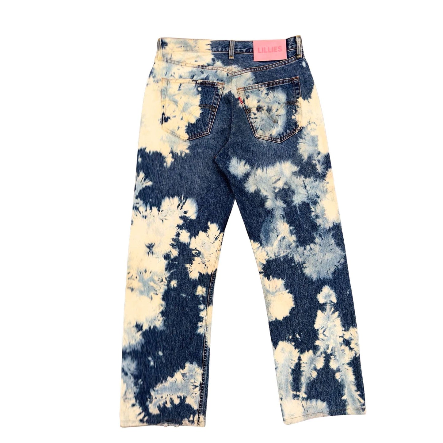 The Frost Jeans are a pair of classic blue, vintage wide leg jeans that have been hand-bleached using a unique technique giving the jean an appearance of frost.