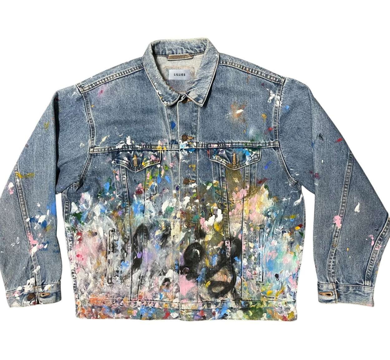 The rainbow jacket is a vintage trucker jacket with hand-painted details
